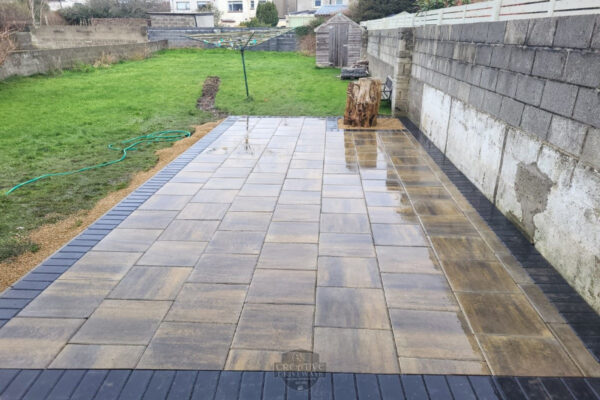 Patio with autumn barleystone flags and damson border in dundrum dublin 8.jpeg