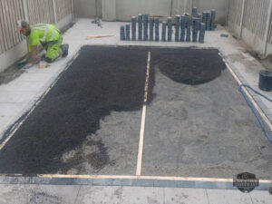 Barleystone Birch Patio with Damson Border and Artificial Grass in Naas, Co. Kildare