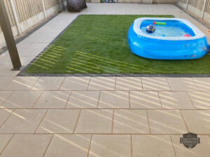 Barleystone Birch Patio with Damson Border and Artificial Grass in Naas, Co. Kildare